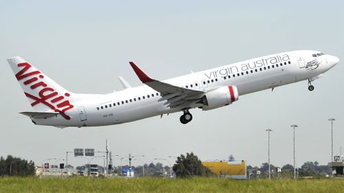 Three Virgin Australia flights have been cancelled at Melbourne Airport today due to low cloud that has affected a number of airlines. Picture: AAP.