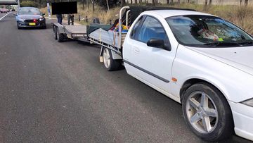 The Ford Falcon was stopped by officers as part of Strike Force Puma, along the M7, near Kings Park.