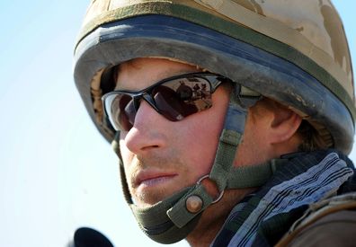 2008. Britain's Prince Harry  sits atop  a military vehicle in the Helmand province, Southern Afghanistan 