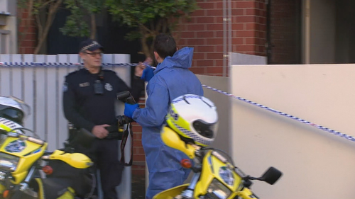 A man is fighting for his life after being shot at a Brisbane home.