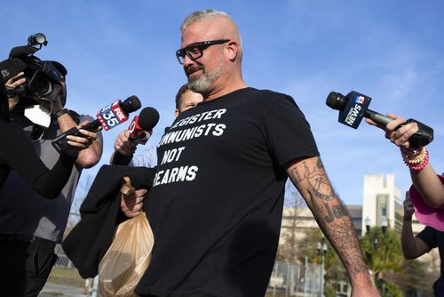Proud Boys organizer Joseph Biggs walks from the George C. Young Federal Annex Courthouse in Orlando, Fla., Jan. 20, 2021, after a court hearing regarding his involvement in riot at the US Capitol on January 6, 2021.