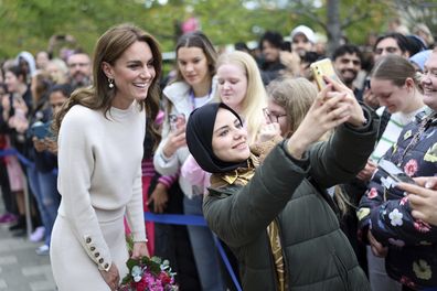 Kate, the Princess of Wales takes selfies with members of the public after a visit to Nottingham Trent University to learn about their mental health support system in Nottingham, England, Wednesday Oct. 11, 2023. 