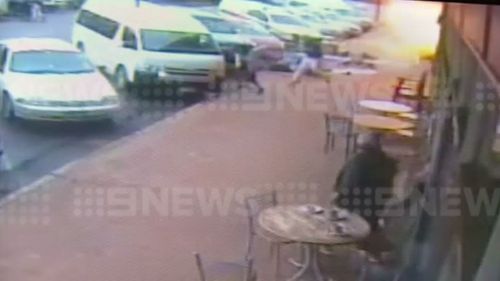 Patrons stand up, dazed by the blast. (9NEWS)