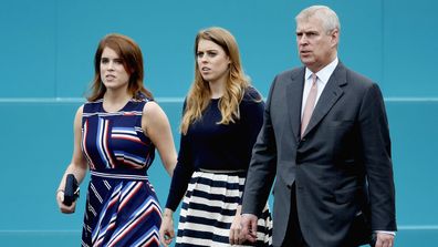 Prince Andrew with his daughters Princess Eugenie (left) and Princess Beatrice.