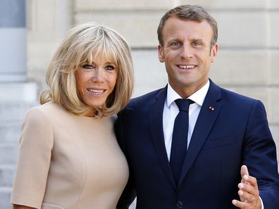 French President Emmanuel Macron and his wife Brigitte Macron at the Elysee Presidential Palace on August 22, 2019 in Paris, France. 