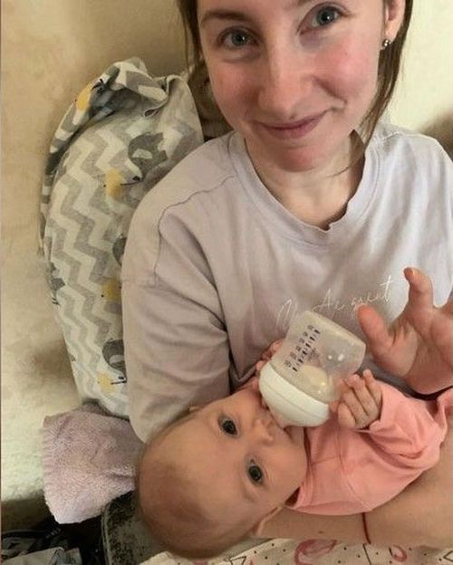 Yuriy Glodan's wife Valeria, with their daughter Kira.