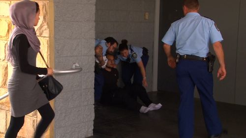 The man was arrested and taken back to Parramatta Police Station. (9NEWS)