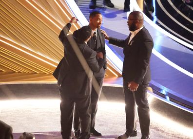 Denzel Washington, and Tyler Perry comfort Will Smith  during the show  at the 94th Academy Awards at the Dolby Theatre at Ovation Hollywood on Sunday, March 27, 2022. 