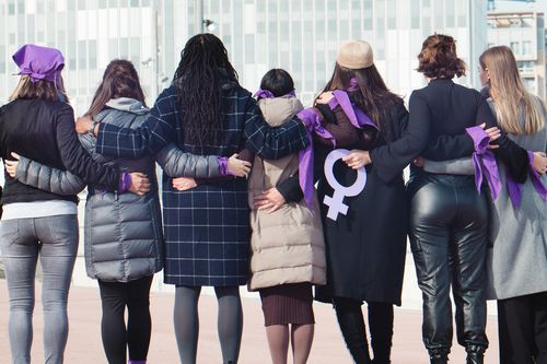 Multiracial group of women only on violence protest International Women's Day