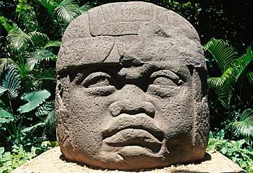 Which civilisation created the colossal heads of ancient Mesoamerica?