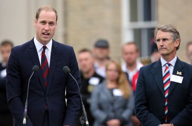 Prince Harry pictured with Bryn Parry during a visit to Tidworth, England in 2013. 