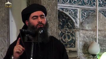 Abu Bakr al-Baghdadi, aka Caliph Ibrahim, adressing Muslim worshippers at a mosque in the militant-held northern Iraqi city of Mosul. 