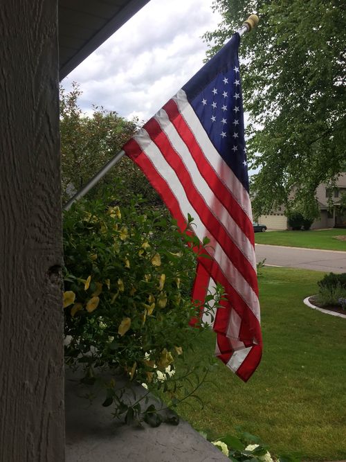 Most homes have US flags flying outside them. (9NEWS)