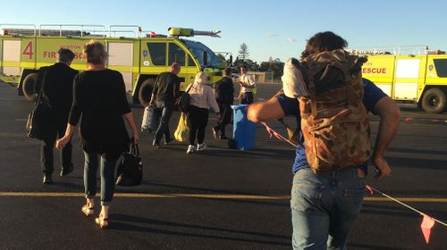 The plane was evacuated around 4:25pm on Friday after arriving from Melbourne. (Supplied)