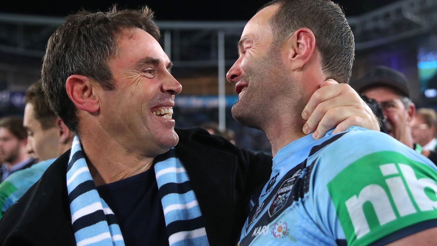 Brad Fittler and Boyd Cordner share an embrace. (Getty)