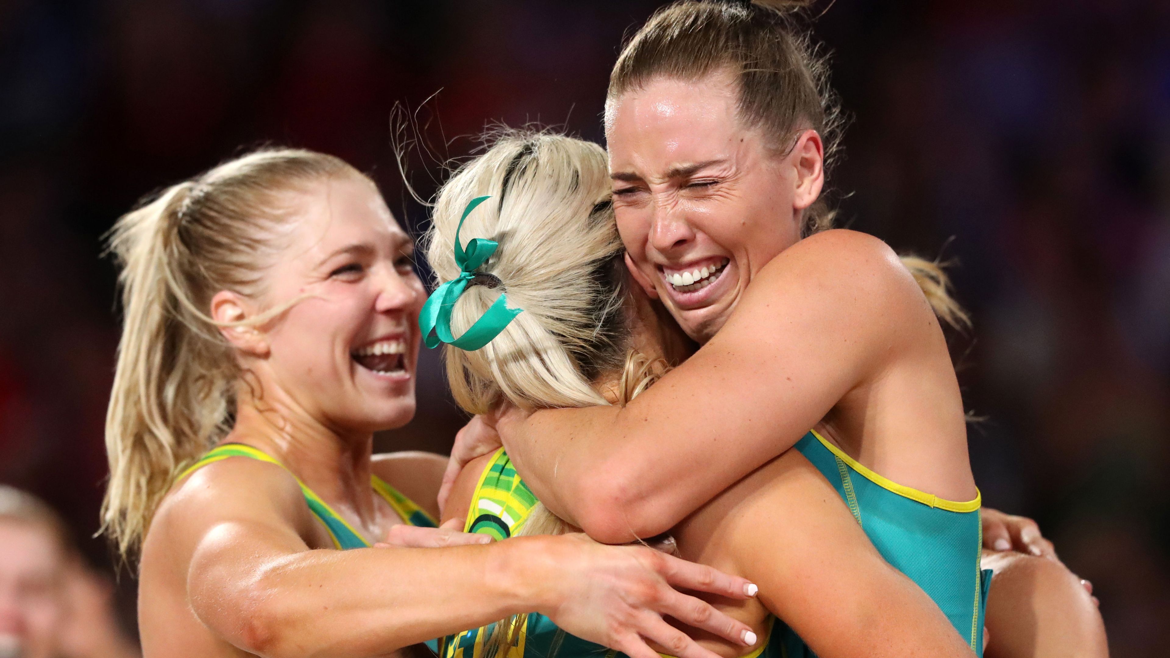 Australia&#x27;s Gretel Bueta, Cara Koenen and Liz Watson celebrate winning the gold medal match against Jamaica.