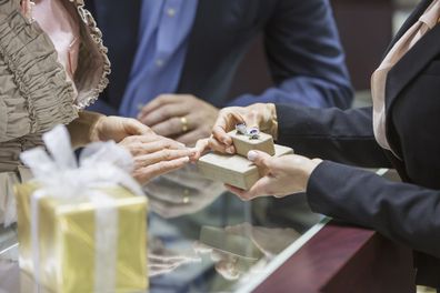 Couple shopping for engagement ring