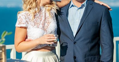 Bride Having a Drink and Embracing her New Brother-In-Law After Wedding Ceremony