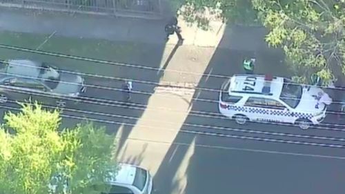 Police at the scene in Box Hill. (9NEWS)