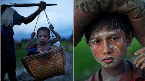 A Rohingya boy is carried in a woven basket as another balances a sack of belongings on his head. (AAP)