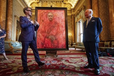 Artist Jonathan Yeo and King Charles III at the unveiling of artist Yeo's portrait of the King, in the blue drawing room at Buckingham Palace, in London, Tuesday May 14, 2024.  