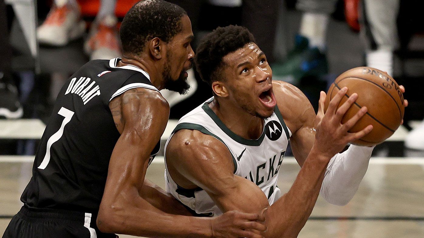 : Giannis Antetokounmpo #34 of the Milwaukee Bucks heads for the net as Kevin Durant #7 of the Brooklyn Nets defends in the second half during game seven of the Eastern Conference second round at Barclays Center on June 19, 2021 in the Brooklyn borough of New York City.