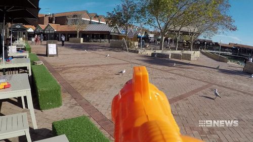 Hillary's 3Sheets restaurant has resorted to equipping customers with water pistols. (9NEWS)