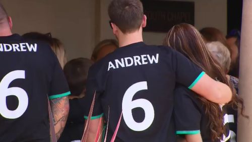 Mourners wore soccer shirts with Andrew's name on the back.