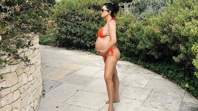 Pregnant Kourtney Kardashian.
