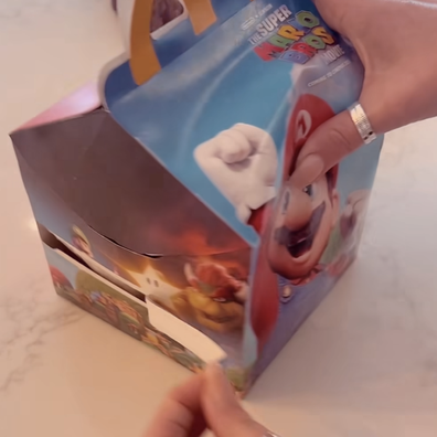 Pulling the tab on your McHappy Meal box can transform it into a disposable plate.