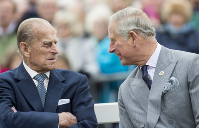 Prince Philip, Duke of Edinburgh and Prince Charles, Prince of Wales attend the unveiling of a statue of Queen Elizabeth The Queen Mother