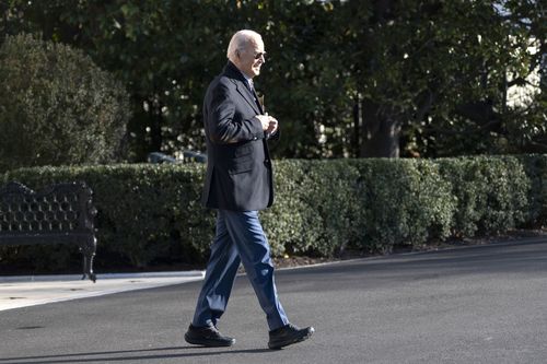 US President Joe Biden walks on the South Lawn of the White House 