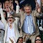 Model and millionaire father steal show at Wimbledon