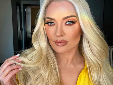 Reality TV star Erika Jayne jokes she's now wearing her clothes twice amid divorce and legal woes.