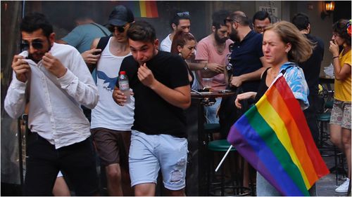 Turkish police dispersed LGBTQI activists on a street in central Istanbul, using tear gas.