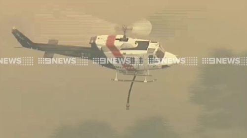 Water bombing aircraft are on scene. (9NEWS)