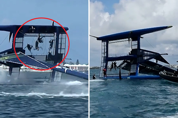 Sailors go flying as the Team USA boat flips during SailGP Bermuda.
