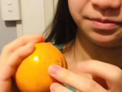 Sarah Espinoza smiling orange discovery shared on facebook