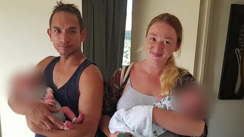 Locals named the father as Wayne Godinet.A 28-year-old woman, believed to be their mother, escaped the blaze and is in hospital.