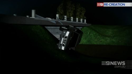 The car plummeted off the bridge and landed on its roof. (9NEWS)