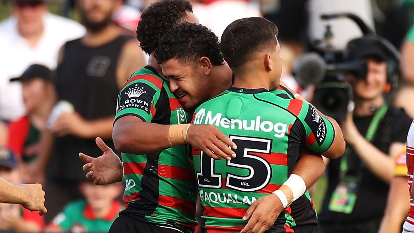 Jacob Gagai celebrates with Souths teammates after scoring a try against the Dragons in the 2023 Charity Shield.