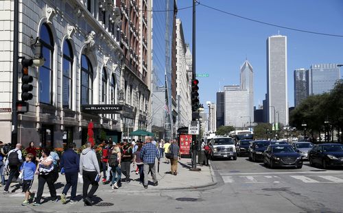 The Blackstone Hotel, left, sits on Michigan Avenue, across the street from Chicago's Grant Park. (AAP)