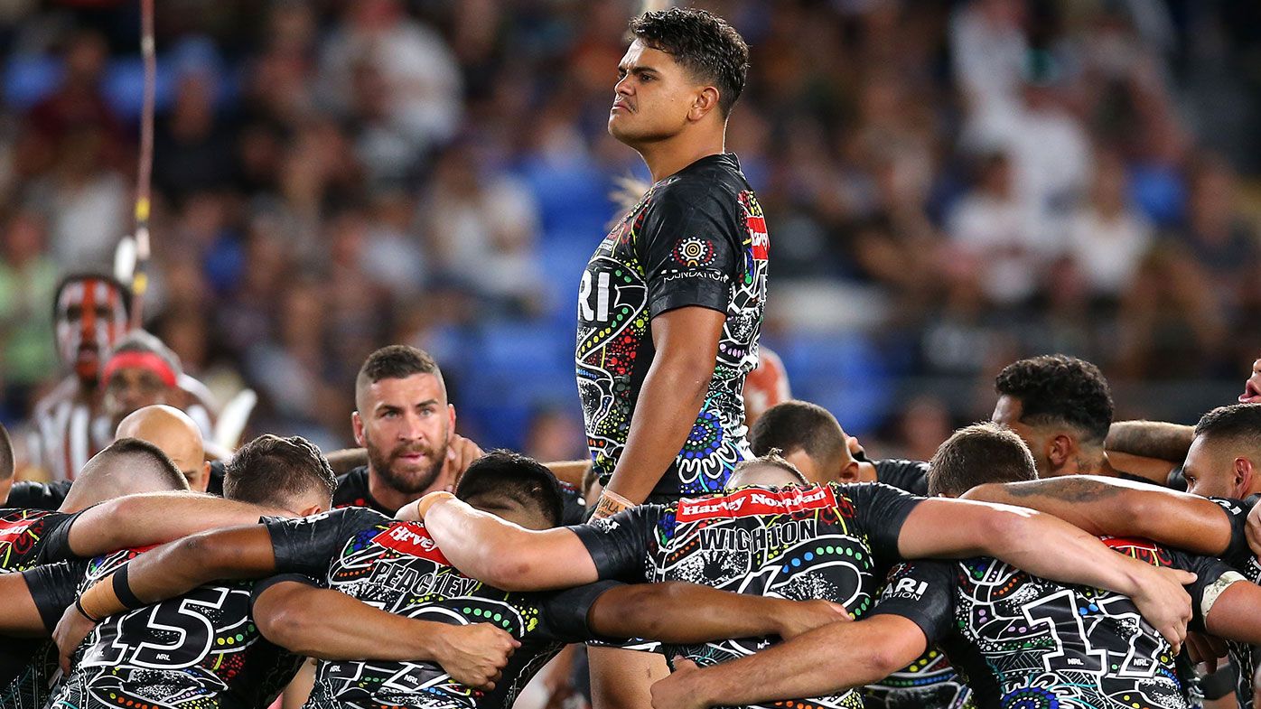 Latrell Mitchell of the Indigenous All-Stars performs an Indigenous dance during the NRL match between the Indigenous All-Stars and the New Zealand Maori Kiwis