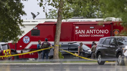Equipment from the San Antonio Fire Department is parked outside Robb Elementary School in Uvalde, Texas.