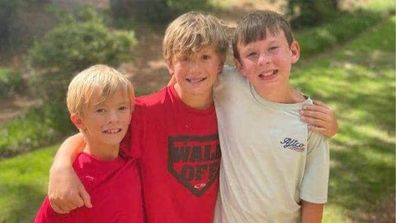 Twins Bridon and Christian Hassig with their friend Sam Erbert, who helped save dad Brad Hassig.