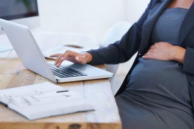 Pregnant woman at work