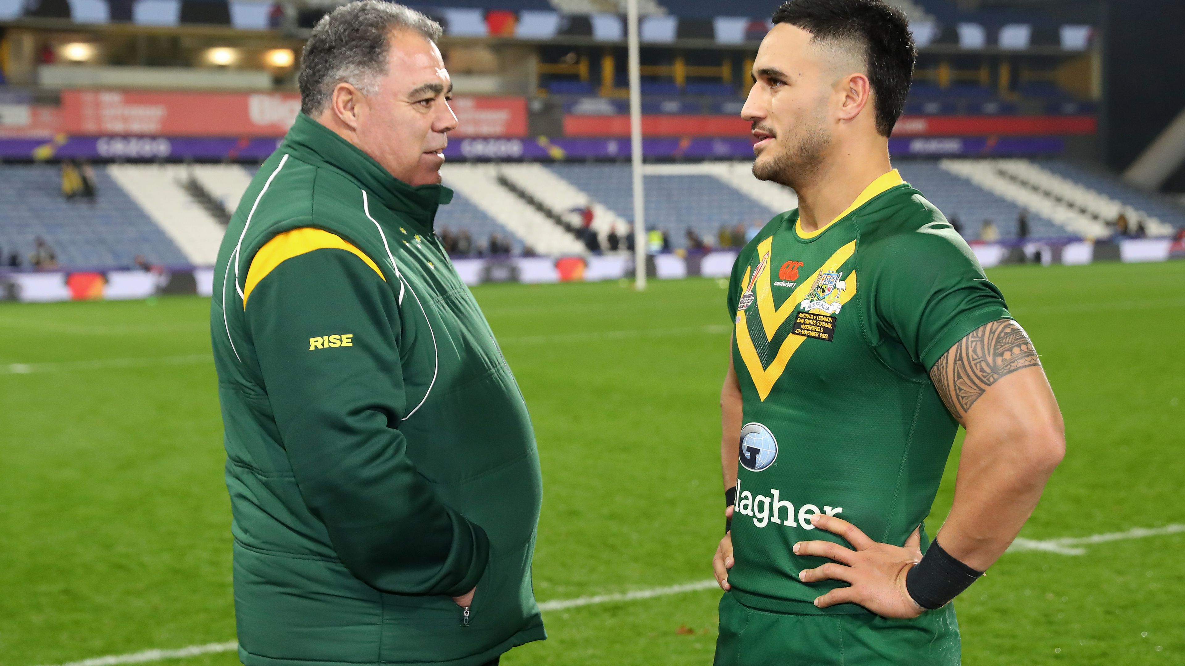 Kangaroos coach Mal Meninga speaks with Valentine Holmes following Australia&#x27;s victory in the Rugby League World Cup quarter-final match between Australia and Lebanon.
