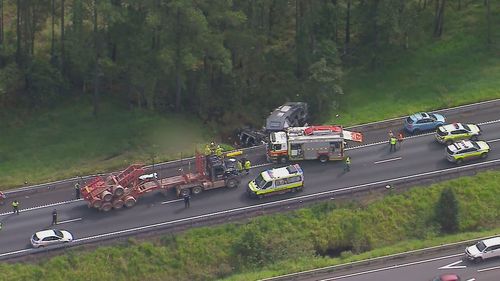 There are grave fears for a man involved in a crash on Queensland's sunshine coast. It is believed a car towing a caravan veered off the Bruce Highway, just before Caloundra, then rolled down an embankment and into a creek at 11.20am today.