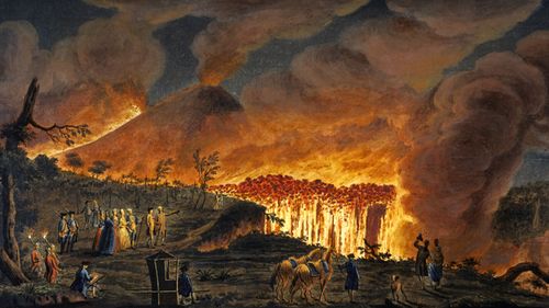 Hand-coloured etching by Peter Fabris (active 1768-1779) shows lava streams running into the valley between Mount Somma and Vesuvius. These streams formed a cascade of fire around 50 metres in height as they headed toward the town of Resina, near Naples. (Getty)