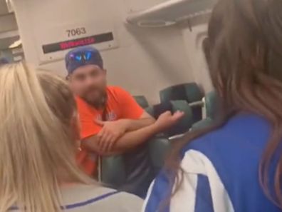 Video captures the moment an entire train carriage confronts a man for slut-shaming a woman
